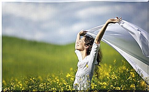 Happy-woman-dressed-in-white