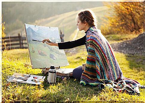 Woman-painting-oil-painting-in-a-field