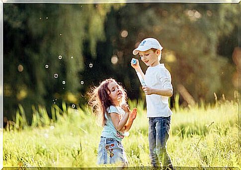 children playing together in a field