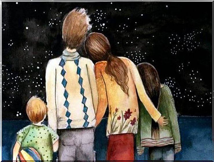 family-contemplating-the-stars